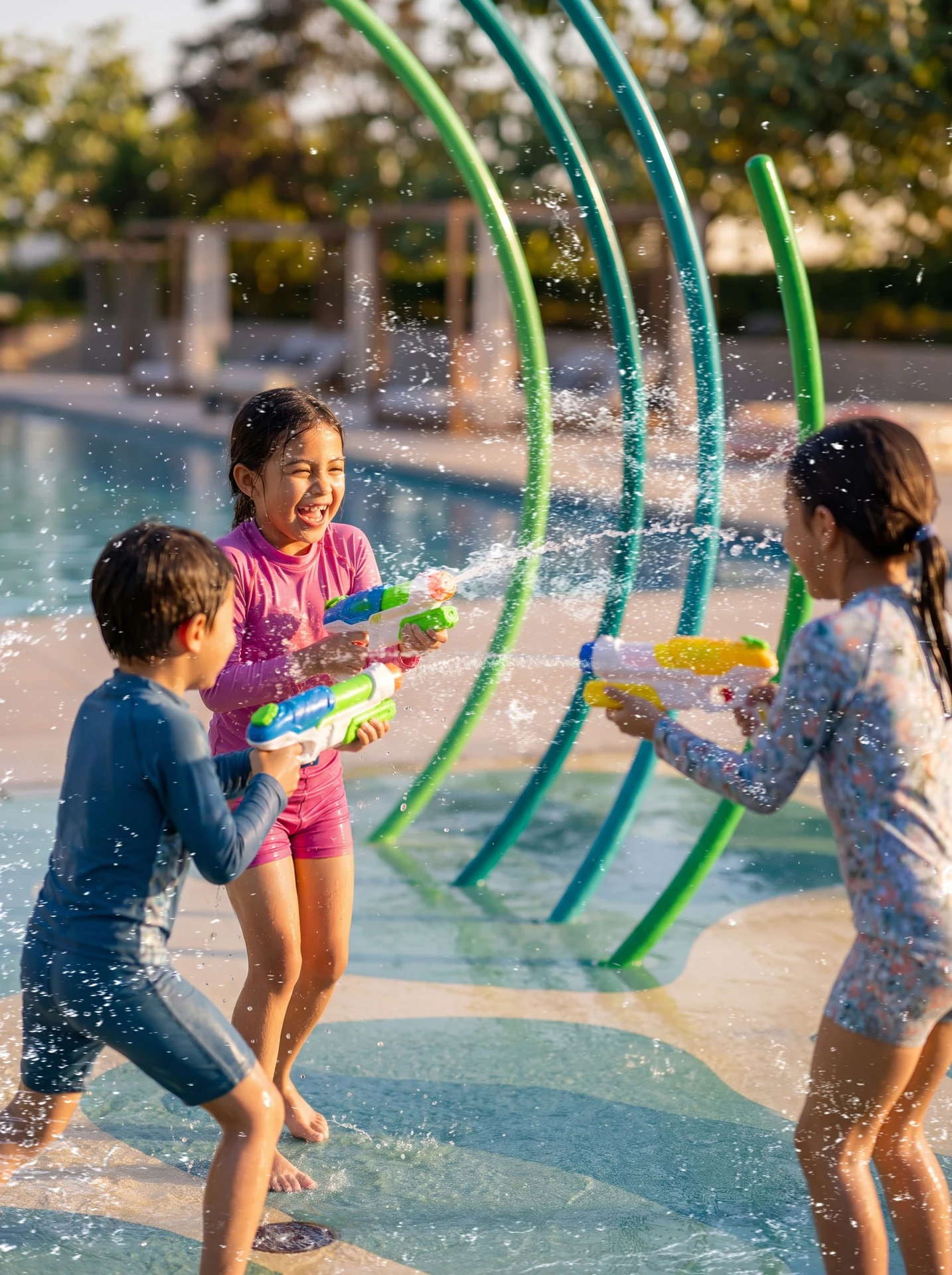 Illustrative splash-pad render at Al Ghadeer Parks 1